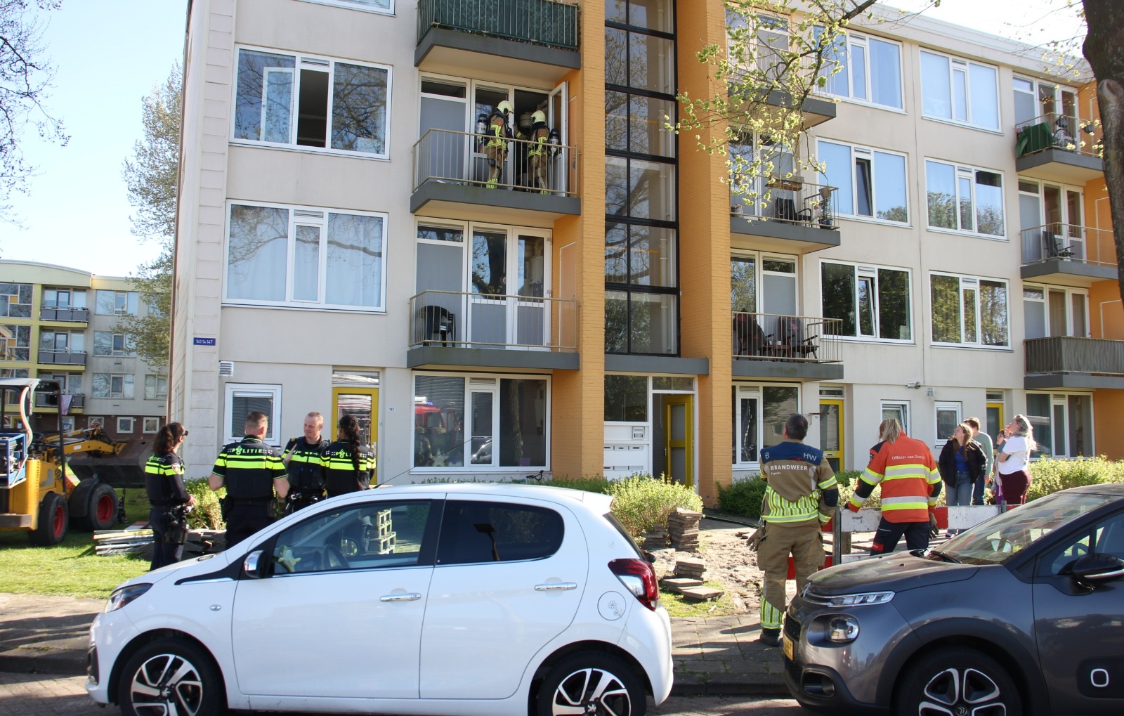 Brand op balkon van portiekflat