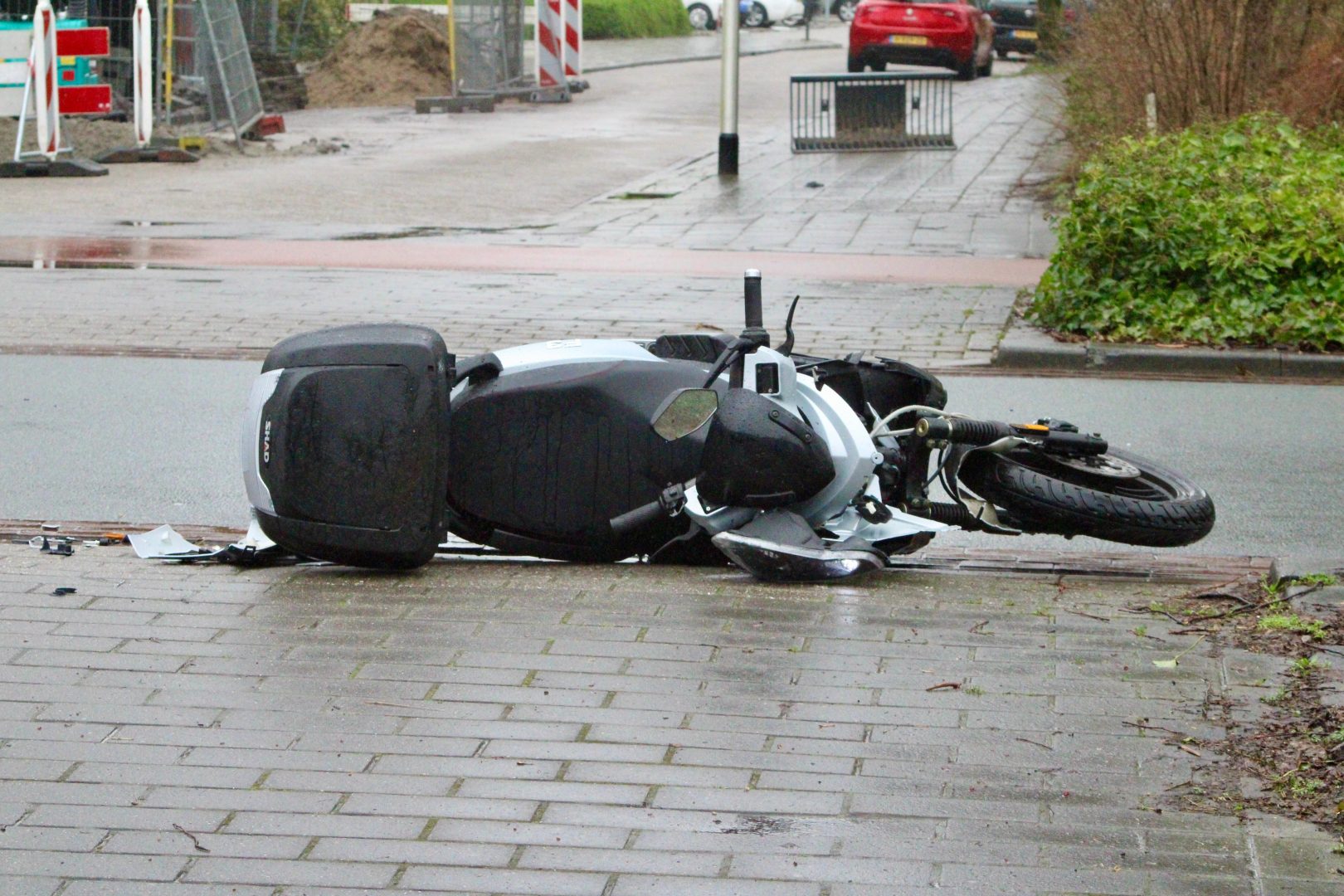 Scooter total loss na botsing met auto